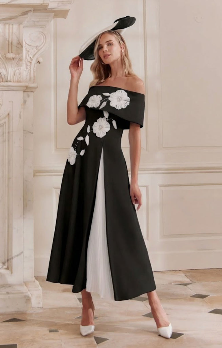 Woman wearing John Charles 29358 - Black and Ivory Bardot A-Line Midi Dress with Chiffon Godet