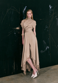 Woman wearing Maisonel ME3228 - Elegant Tailored Latte Occasion Dress for Mother of the Bride and Groom with a black background