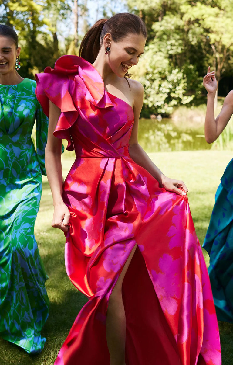 Lady wearing Rosa Clará 9TE6 - Red and Fuchsia Printed A-Line Gown with Asymmetric Neckline